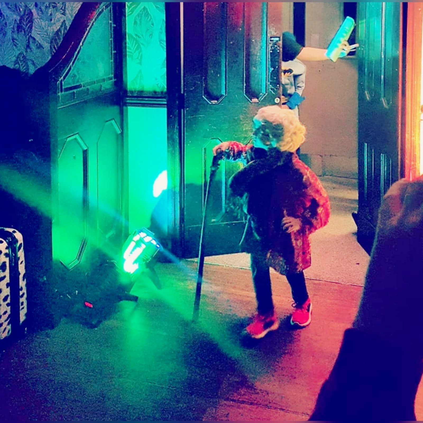Walk-on at doors with green smoke and lights